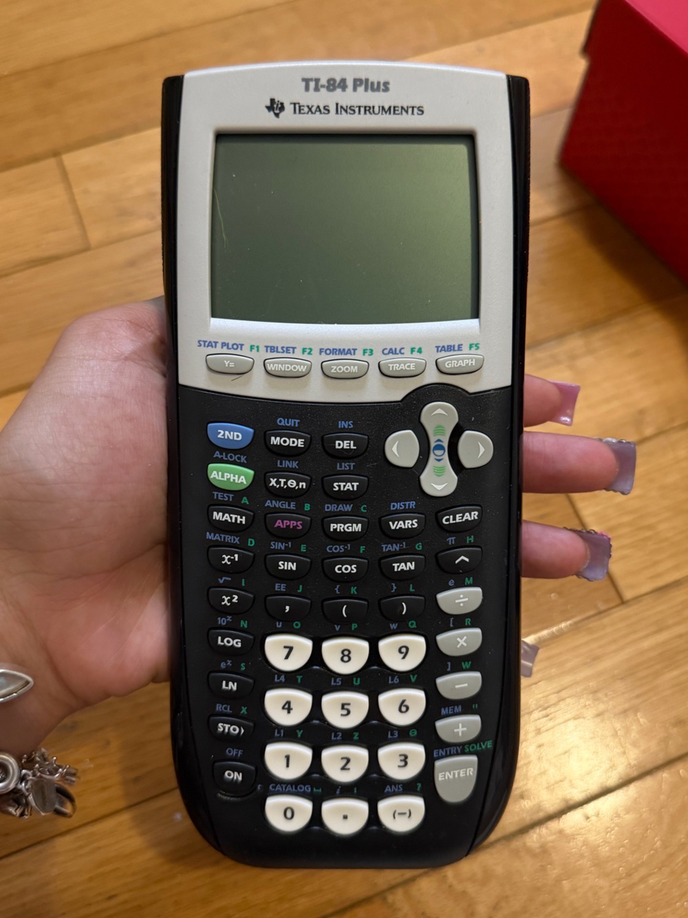 Texas Instruments Graphing Calculator in Black and White Keys